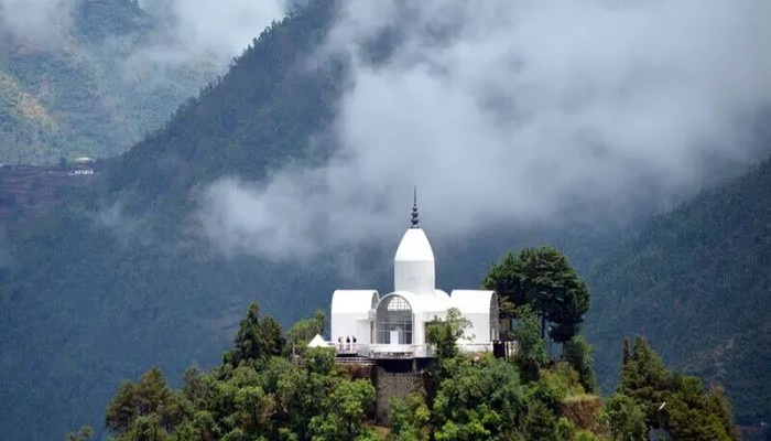 Jwala Devi Temple in Mussoorie, a sacred hilltop shrine surrounded by forested hills and panoramic valley views.