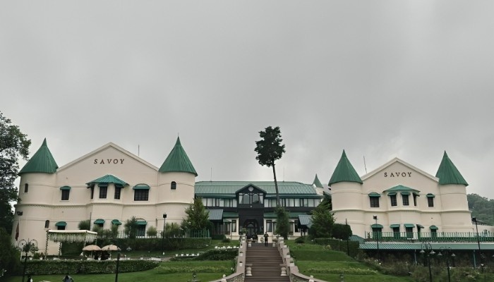 Savoy Hotel area in Mussoorie featuring colonial architecture, landscaped gardens, and a peaceful hill-station atmosphere.