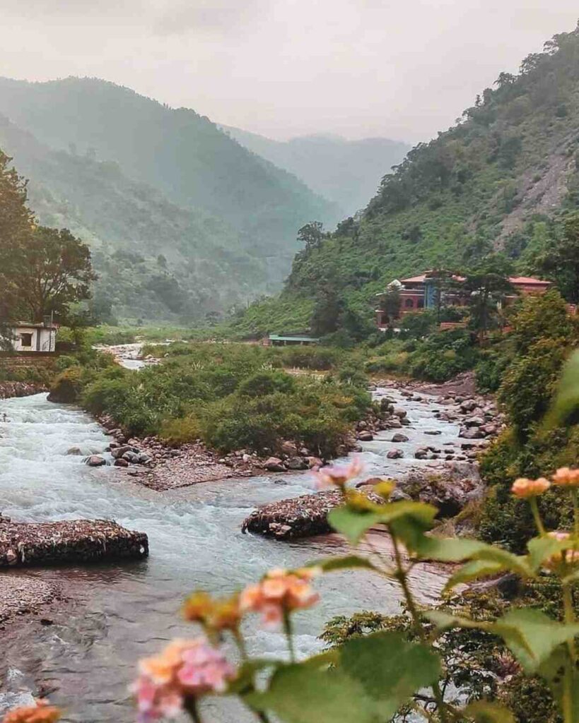 Maldevta Dehradun riverside picnic spot with hills.