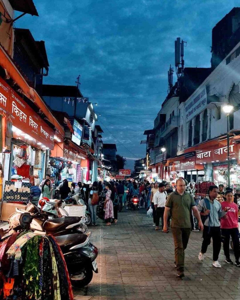 Paltan Bazaar Dehradun busy local market street.