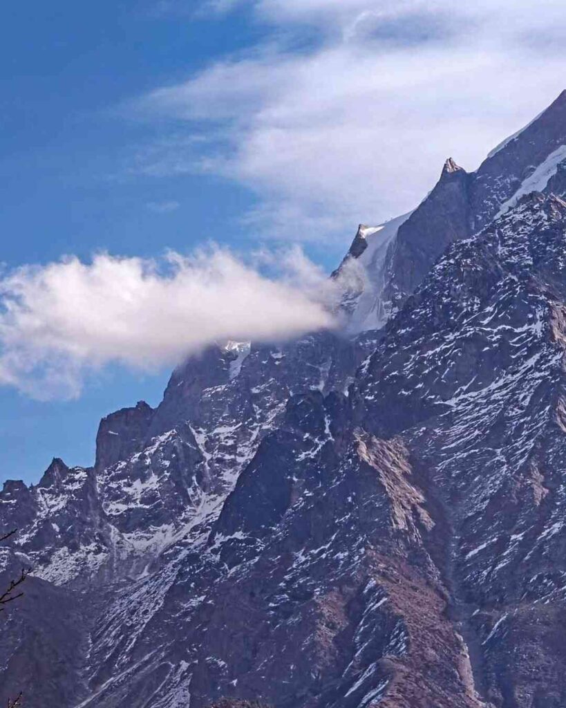 Kalpa in Himachal Pradesh, offering breathtaking views of Kinner Kailash, snow-capped mountains, and pine forests