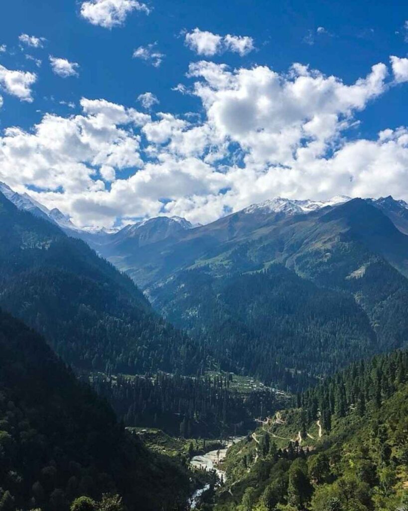 Kasol in Himachal Pradesh, known as a backpacker’s paradise, with Parvati River, lush hills, and scenic landscapes
