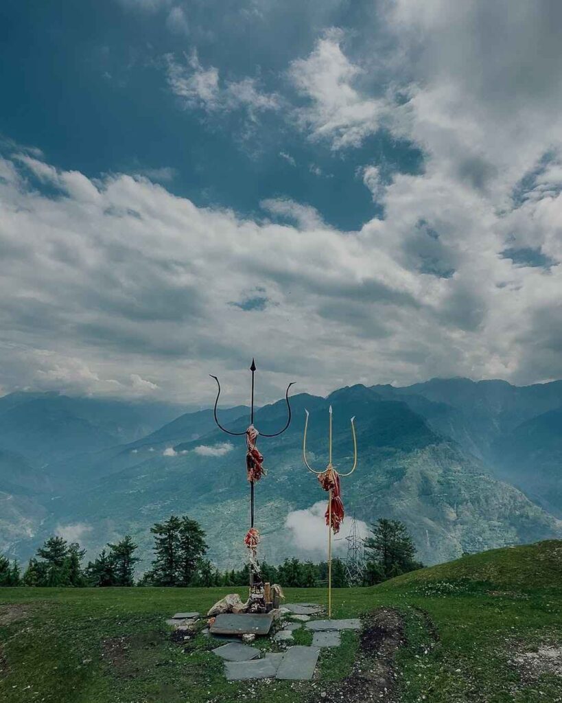 Kullu in Himachal Pradesh, known as the Valley of Gods, featuring lush valleys, river, and snow-capped mountains