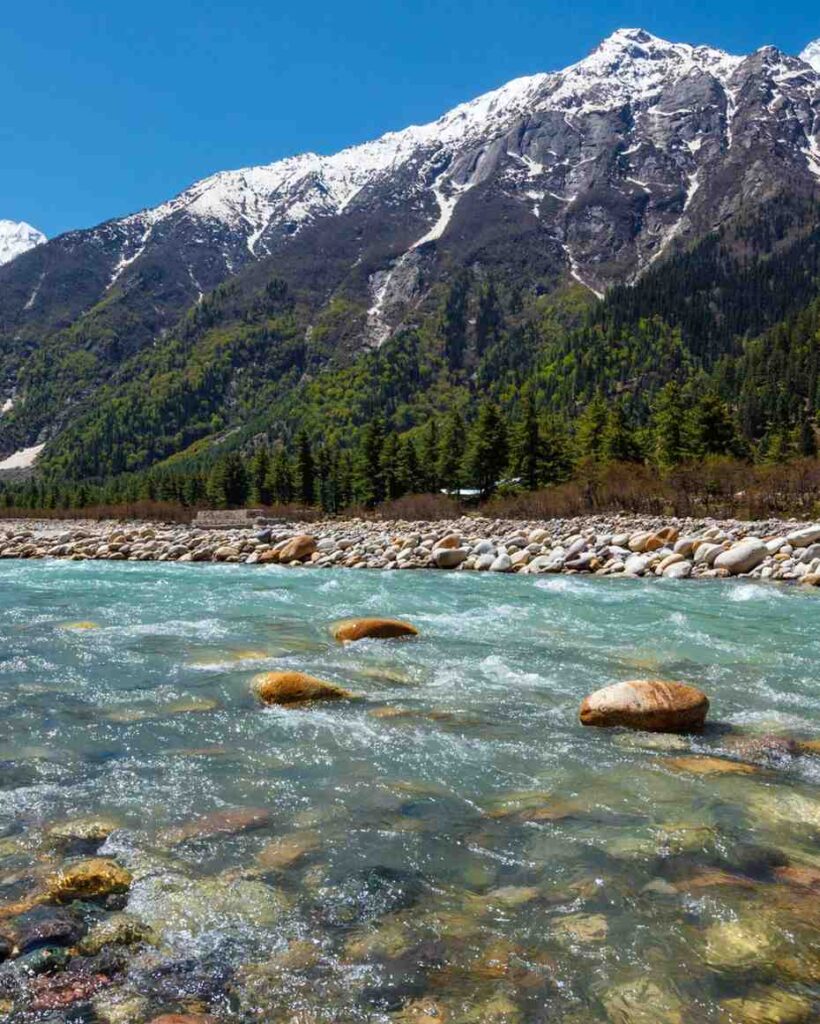 Sangla Valley in Himachal Pradesh, a Himalayan beauty with lush green valleys, rivers, and snow-capped mountains