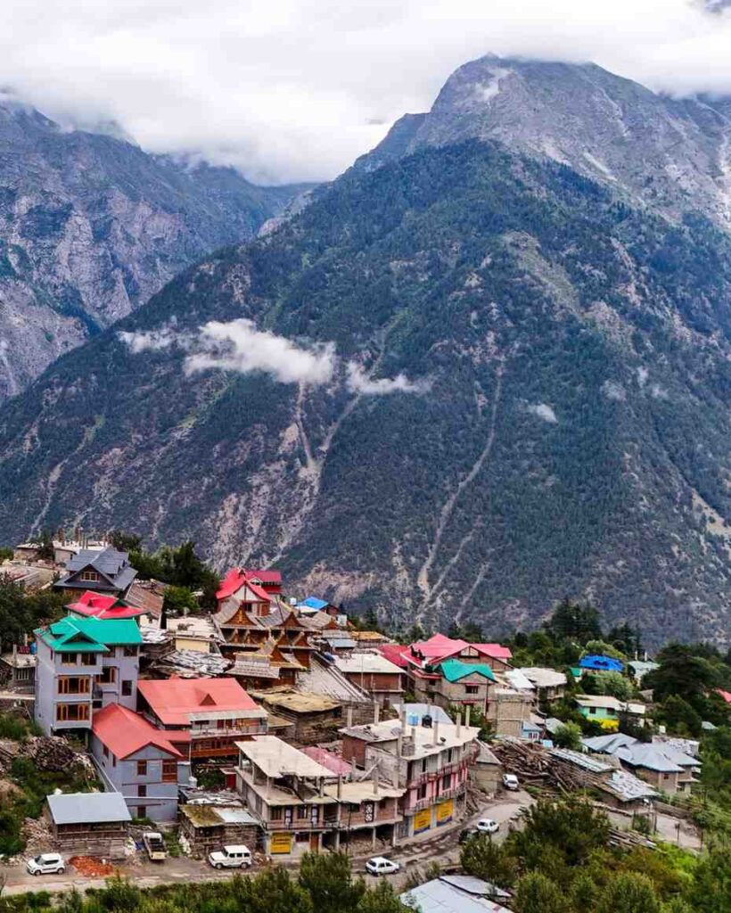 Panoramic view of Una town with green hills, rivers, and lush surroundings, highlighting its position as the gateway to Lower Himachal