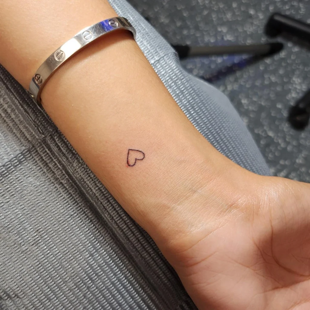 Fine-Line Heart Tattoo
